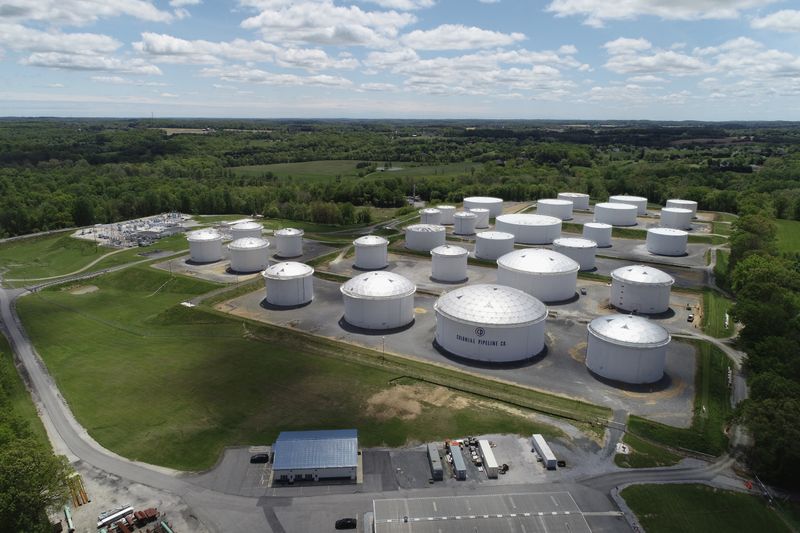 &copy; Reuters. FILE PHOTO: Holding tanks are seen in an aerial photograph at Colonial Pipeline's Dorsey Junction Station in Woodbine, Maryland, U.S. May 10, 2021. REUTERS/Drone Base