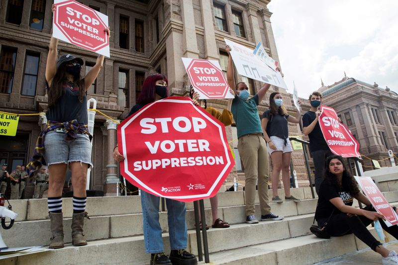 &copy; Reuters. FILE PHOTO: Voting rights activists gather during a protest against Texas legislators who are advancing a slew of new voting restrictions in Austin, Texas, U.S., May 8, 2021.  REUTERS/Mikala Compton