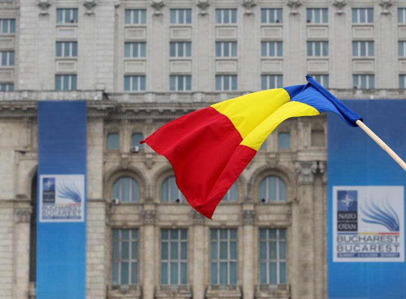 &copy; Reuters. Romanian flag is seen in front of the Parliament Palace in Bucharest April 1, 2008. Once a laggard among former Soviet allies in joining the European Union and NATO, Romania hopes the military alliance's summit in Bucharest this week will earn the Black S