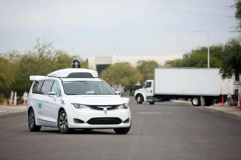 &copy; Reuters. FILE PHOTO: A Waymo Chrysler Pacifica Hybrid self-driving vehicle returns to a depot in Chandler, Arizona