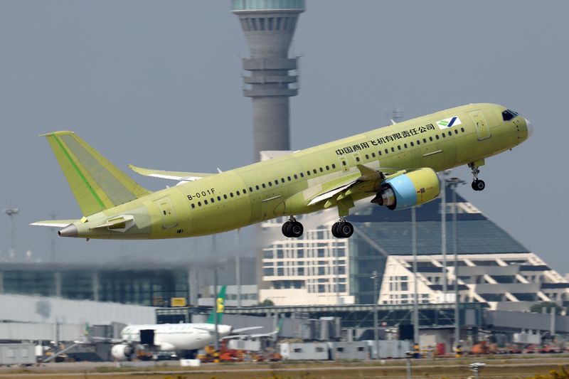&copy; Reuters. FILE PHOTO: The fifth prototype of China's home-built C919 passenger plane takes off for its first test flight from Shanghai Pudong International Airport in Shanghai, China October 24, 2019. Picture taken October 24, 2019. REUTERS/Stringer