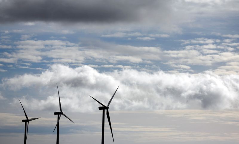 &copy; Reuters. FILE PHOTO: Iberdrola's power generating wind turbines are seen against cloudy sky at Moranchon wind farm in central Spain December 17, 2012.   REUTERS/Sergio Perez