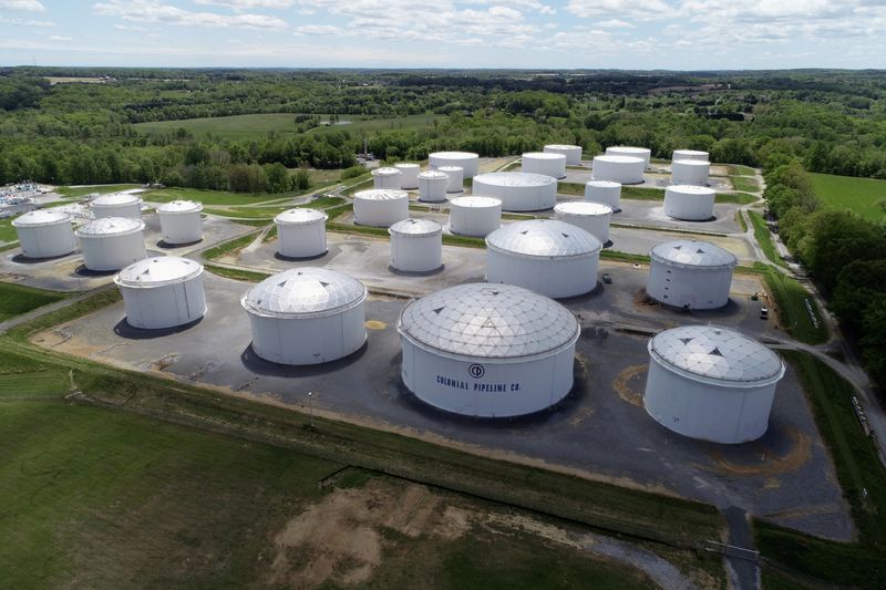 &copy; Reuters. FILE PHOTO: Holding tanks are seen in an aerial photograph at Colonial Pipeline's Dorsey Junction Station in Woodbine, Maryland, U.S. May 10, 2021. REUTERS/Drone Base