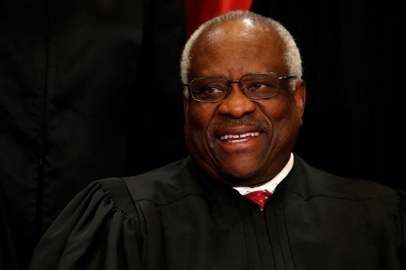 &copy; Reuters. FILE PHOTO: U.S. Supreme Court Justice Clarence Thomas participates in taking a new "family photo" with his fellow justices at the Supreme Court building in Washington, D.C., U.S., June 1, 2017. REUTERS/Jonathan Ernst
