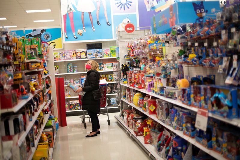 &copy; Reuters. A shopper wearing a face mask due to the coronavirus disease (COVID-19) pandemic browses toys at a Target store in King of Prussia