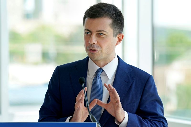 &copy; Reuters. FILE PHOTO: Transportation Secretary Pete Buttigieg makes comments at Union Station in Raleigh, N.C., Friday, April 30, 2021. Gerry Broome/Pool via REUTERS