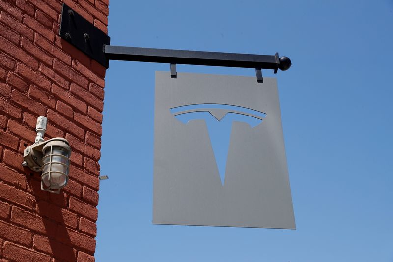 &copy; Reuters. FILE PHOTO: The TESLA logo is seen outside a dealership in the Brooklyn borough of New York City, U.S., April 26, 2021. REUTERS/Shannon Stapleton