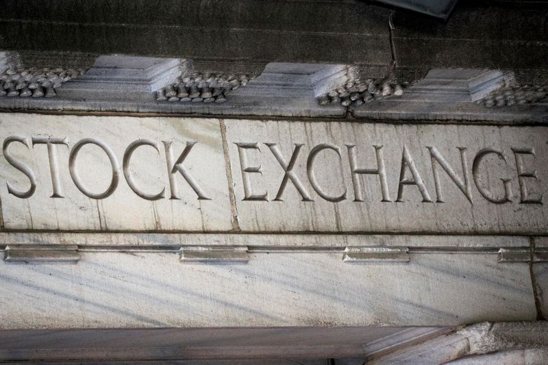 © Reuters. FILE PHOTO: An entrance to the NYSE on Wall Street in New York