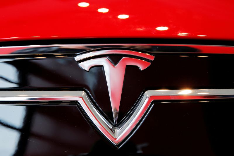 &copy; Reuters. FILE PHOTO: A Tesla logo on a Model S is photographed inside of a Tesla dealership in New York, U.S., April 29, 2016. REUTERS/Lucas Jackson//File Photo