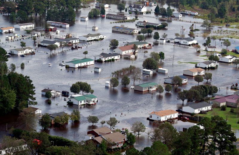 &copy; Reuters. FILE PHOTO: Houses sit in floodwater caused by Hurricane Florence, in this aerial picture, in Lumberton