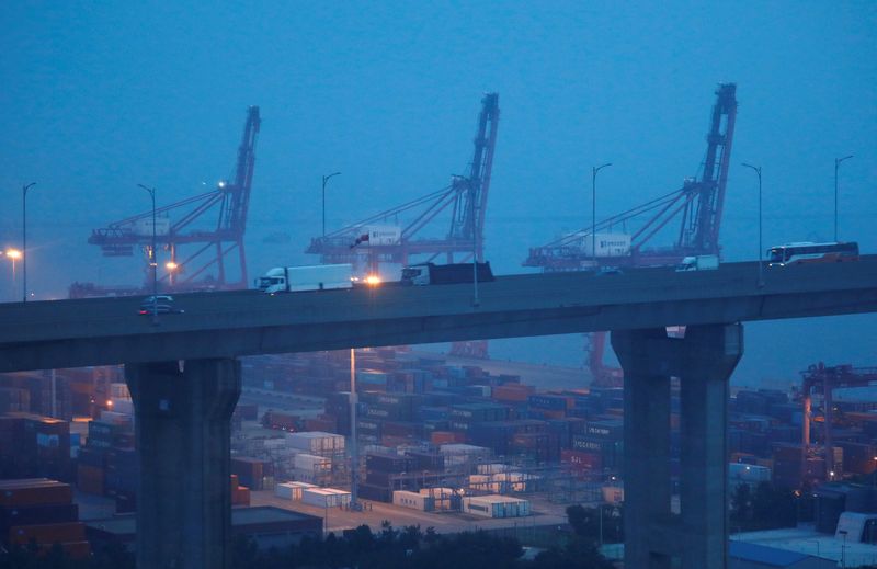 &copy; Reuters. FILE PHOTO: Cranes and shipping containers are seen at Pyeongtaek port in Pyeongtaek, South Korea, July 9, 2020. REUTERS/Kim Hong-Ji