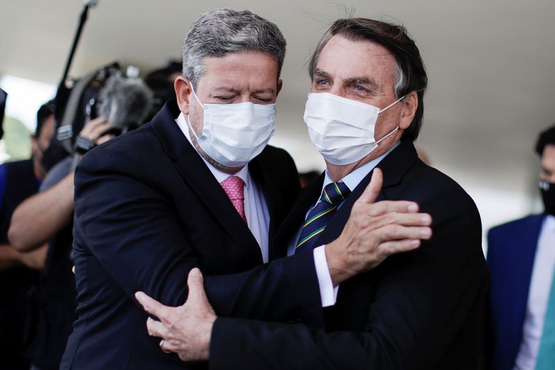 &copy; Reuters. Presidente Jair Bolsonaro e presidente da Câmara, Arthur Lira
25/03/2021
REUTERS/Ueslei Marcelino