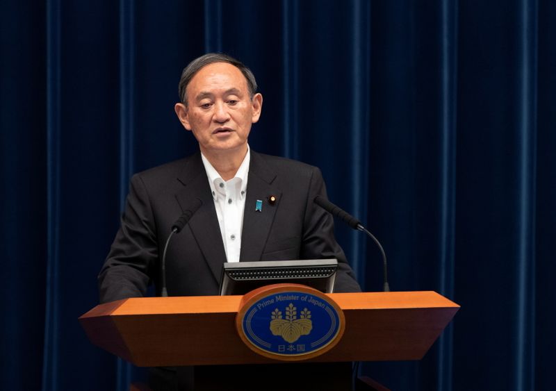 &copy; Reuters. 　５月１４日、菅義偉首相は、緊急事態宣言の対象に北海道と岡山・広島県を追加した判断について、専門家から強いメッセージが必要との指摘があったためなどと説明した。写真は７日代