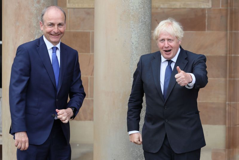&copy; Reuters. Britain's Prime Minister Boris Johnson and Ireland's Prime Minister (Taoiseach) Micheal Martin are seen at Hillsborough Castle, in Belfast, Northern Ireland August 13, 2020. Brian Lawless/Pool via Reuters