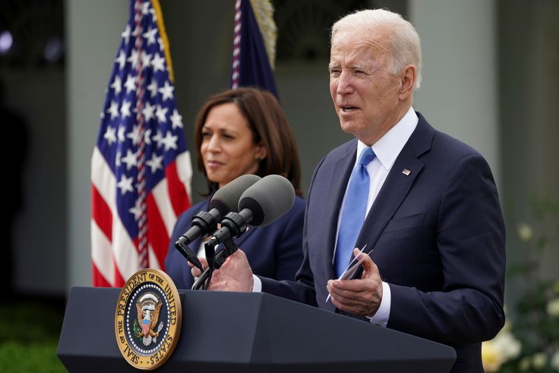 &copy; Reuters. FILE PHOTO: U.S. President Joe Biden, accompanied by Vice President Kamala Harris, speaks about the coronavirus disease (COVID-19) response and the vaccination program from the Rose Garden of the White House in Washington, U.S., May 13, 2021. REUTERS/Kevi