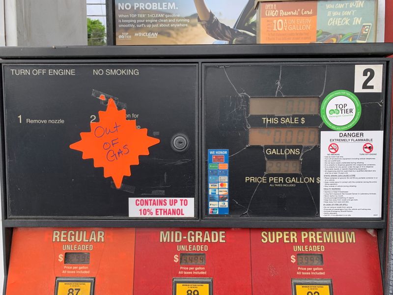 &copy; Reuters. An "out of gas" sticker is seen on a gas pump at a gas station in Waynesville, North Carolina, after a gasoline supply crunch caused by the Colonial Pipeline hack, May 11, 2021. Martin Brossman via REUTERS  