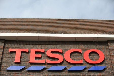 © Reuters. A sign spells out the store name on a Tesco store in Bow, east London