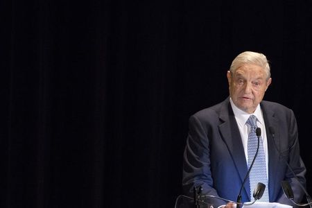 © Reuters. George Soros speaks on stage at the Annual Freedom Award Benefit Event hosted by the International Rescue Committee at the Waldorf-Astoria in New York