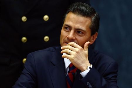 © Reuters. Mexico's President Enrique Pena Nieto looks on during a ceremony to announce the new international airport in Mexico City