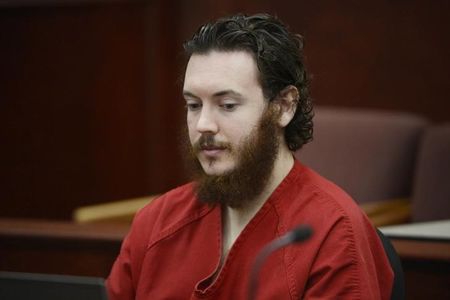 © Reuters. James Holmes sits in court for an advisement hearing at the Arapahoe County Justice Center in Centennial