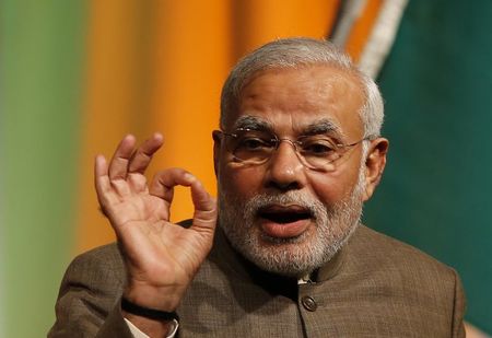 © Reuters. India's PM Modi gives a speech at his lecture meeting hosted by Nikkei Inc. and JETRO in Tokyo