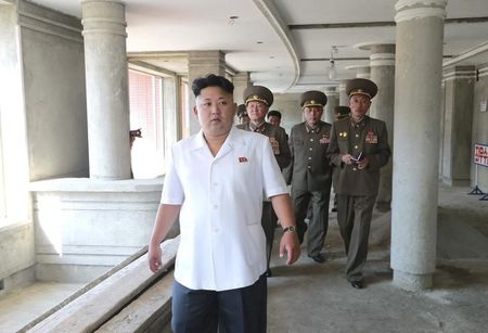 © Reuters. North Korean leader Kim Jong Un gives field guidance to the construction site of apartment houses for educators of Kim Chaek University of Technology in this undated photo released by North Korea's KCNA in Pyongyang