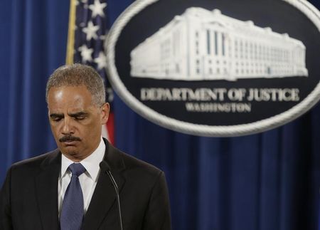 © Reuters. United States Attorney General Holder holds a news conference announcing updates on investigation of Brown shooting in Ferguson Missouri, in Washington