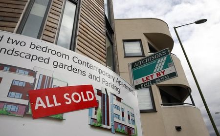 © Reuters. A sign is seen outside some newly built apartments in Berkhampstead, southern England