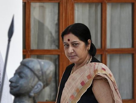 © Reuters. India's new Foreign Minister Swaraj arrives to attend a meeting between India's PM Modi and Afghanistan's President Karzai in New Delhi