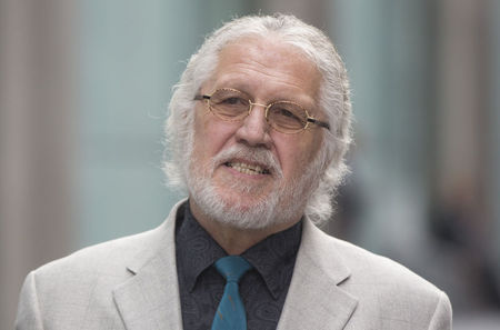 © Reuters. Former Radio 1 DJ, Dave Lee Travis arrives at Southwark Crown Court in London