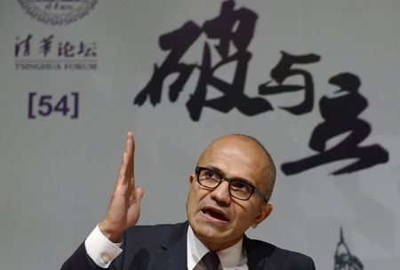 © Reuters. Microsoft Chief Executive Satya Nadella gestures as he speaks during a forum at Tsinghua University in Beijing