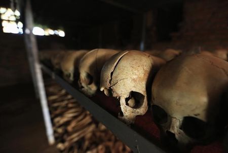 © Reuters. Preserved skulls are spread out on metal shelf in Catholic church in Nyamata