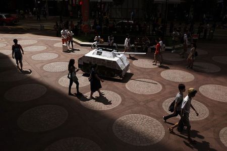 © Reuters. File photo of  mock tank displayed by local artists at a shopping district in Hong Kong