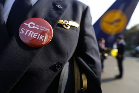 © Reuters. File photo of Lufthansa pilot wearing badge reading 
