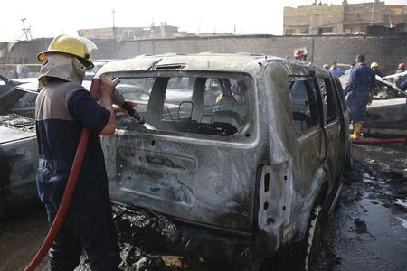 © Reuters. مقتل 35 شخصا في موجة هجمات بأحياء شيعية في بغداد