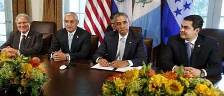 © Reuters. U.S. President Obama pauses while he hosts a meeting with El Salvador's President Sanchez Ceren, Guatemala's President Perez Molina and Honduras' President Orlando Hernandez in the Cabinet Room of the White House in Washington