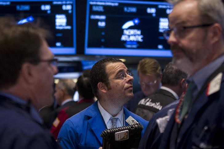 Wall Street tumbles on Ebola fears; small caps drop