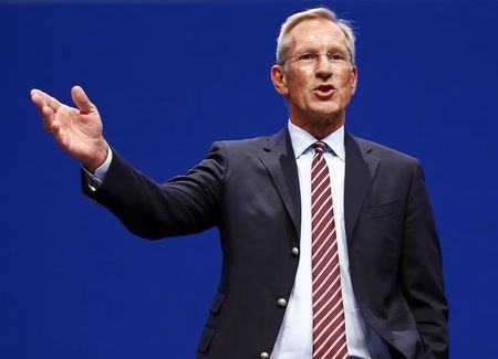 © Reuters. Diekmann, CEO of insurer Allianz SE gestures before the company's annual shareholder meeting in Munich