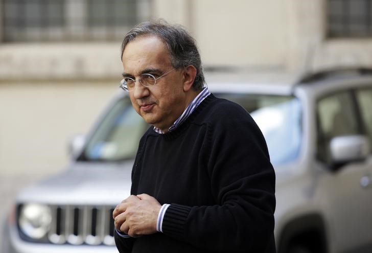 &copy; Reuters Fiat Chief Executive Marchionne looks on during a meeting with Italian Prime Minister Renzi (not pictured) to mark the presentation of new &quot;Jeep Renegade&quot; car at Chigi palace, in Rome