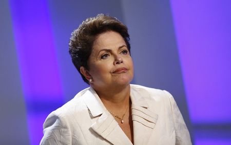 © Reuters. Brazil's presidential candidate Rousseff of Workers Party (PT) takes part in a TV debate in Rio de Janeiro