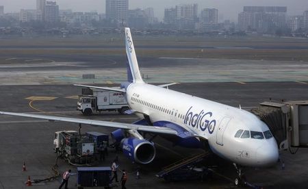 © Reuters. An IndiGo Airlines Airbus A320 aircraft is pictured parked at a gate at Mumbai's Chhatrapathi Shivaji International Airport