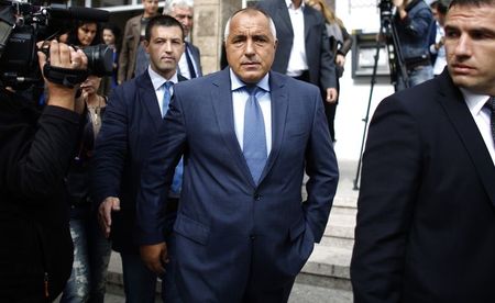 © Reuters. Boiko Borisov, leader of Bulgaria's centre right GERB party, leaves a polling station after casting his vote in Sofia