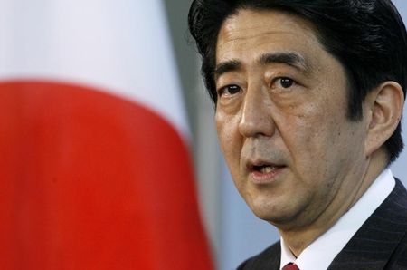 © Reuters. Japan's Prime Minister Shinzo Abe addresses a news conference following a meeting with German Chancellor Angela Merkel in Berlin