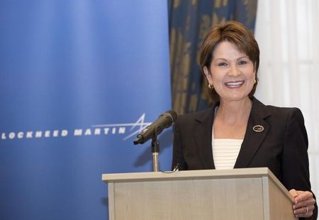 © Reuters. Chief Executive Officer and President of Lockheed Martin Corporation Marillyn A. Hewson speaks at a news conference in London