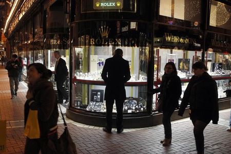 © Reuters. A man looks at a window display of jewellery on Grafton Street