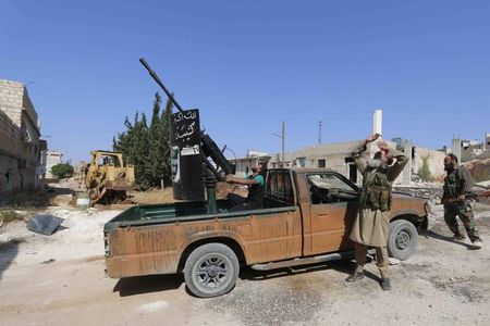 © Reuters. تلفزيون رويترز: الدولة الإسلامية ترفع رايتها على الجانب الشرقي من كوباني