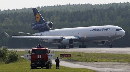 © Reuters. A McDonnell-Douglas MD-11 jet of Lufthansa Cargo AG taxis along the tarmac of Yemelyanovo airport