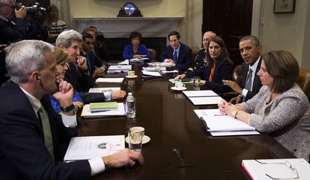 © Reuters. U.S. President Obama meets with members of his national security team and senior staff to receive an update on the Ebola outbreak in West Africa, at the White House in Washington