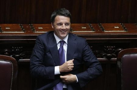 © Reuters. Italian Prime Minister Matteo Renzi smiles after he delivered his speech at the Italian Parliament in Rome