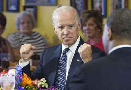 © Reuters. U.S. Vice President Joe Biden speaks with politicians and business owners in a round table discussion on raising the minimum wage at Casa Don Juan restaurant in Las Vegas